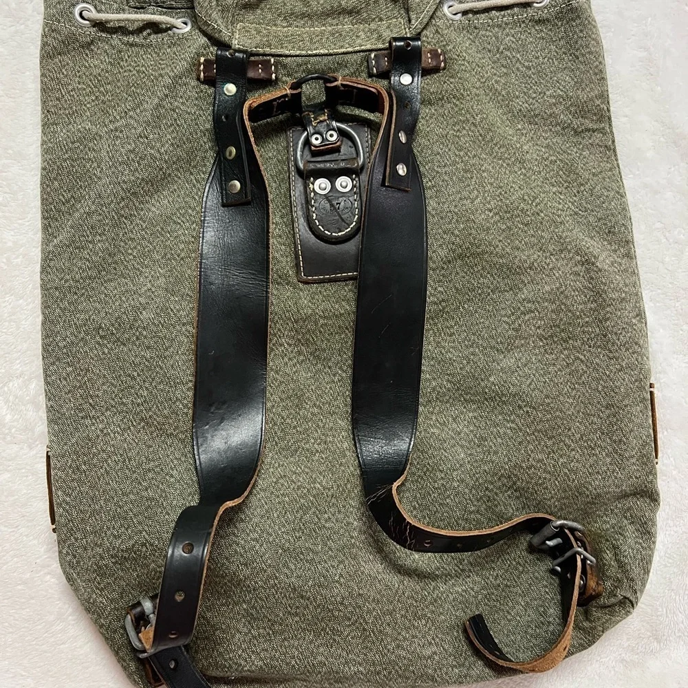 Swiss army inspired back pack leather accents
